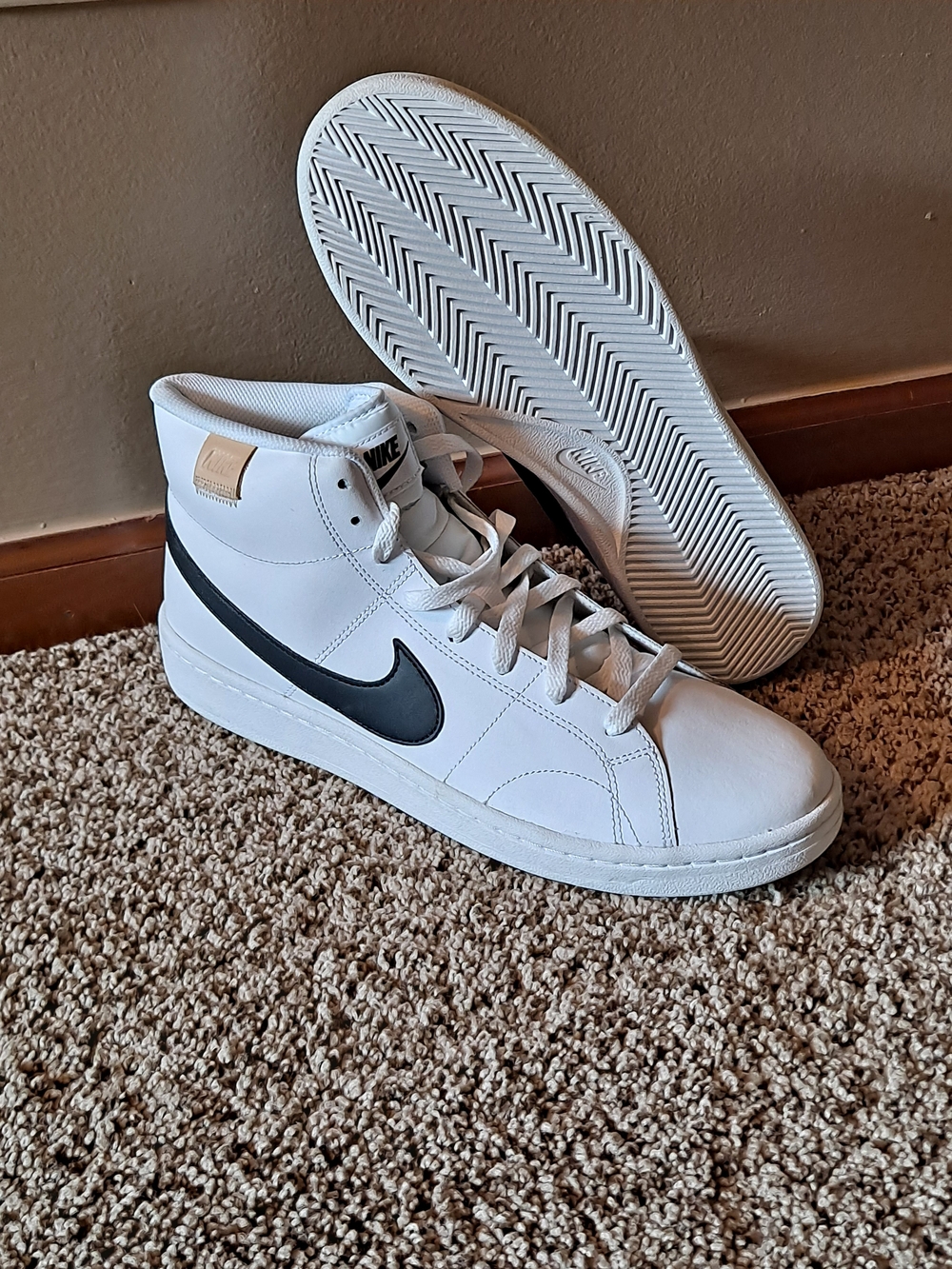 Nike Men’s White High-Top Leather Sneakers with Black Swoosh Size 10.5